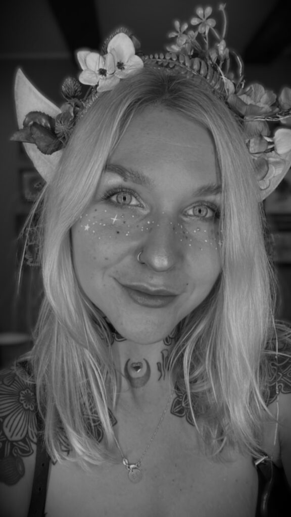 Black and white portrait of tattoo artist Kristina Mangani at Super7 Tattoo studio in Vilnius